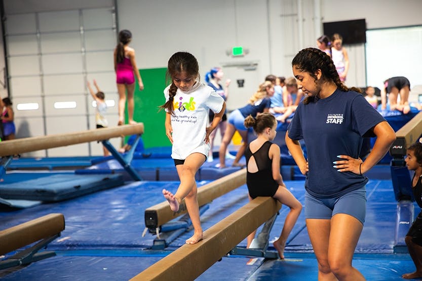 girl on beam